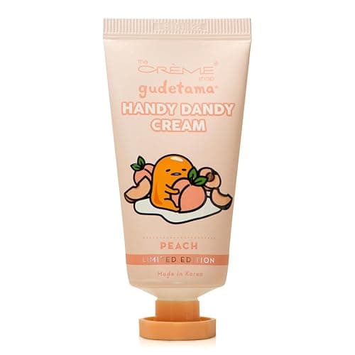 The Crème Shop Korean Cute Scented Pocket Portable Soothing Advanced Must-Have on-the-go x Sanrio Hello Kitty Handy Dandy Cream (Peach) - Image 1