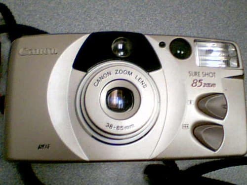 Canon Sure Shot 85 Zoom SAF 35mm Film Camera P&S w/Canon Zoom Lens 38-85mm Autoboy Prima 85 - Built in Flash and Film Motor Drive (Renewed) - Image 1