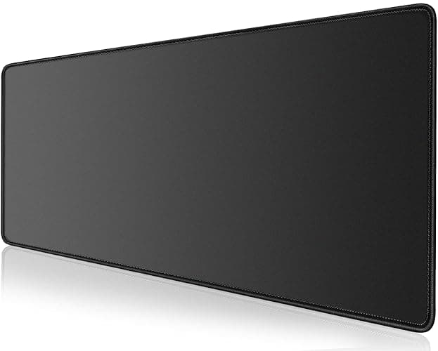 KTRIO Large Gaming Mouse Pad with Superior Micro-Weave Cloth, Extended Desk Mousepad with Stitched Edges, Non-Slip Base, Water Resist Keyboard Pad for Gamer, Office & Home, 31.5 x 11.8 in, Black - Image 1
