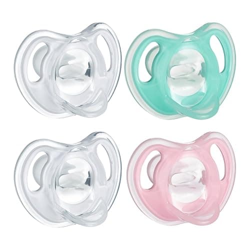 Tommee Tippee Ultra-Light Silicone Pacifier, 0-6 Months, Symmetrical One-Piece Design, BPA-Free Silicone Binkies, Clear/Green/Pink, Pack of 4 - Image 1
