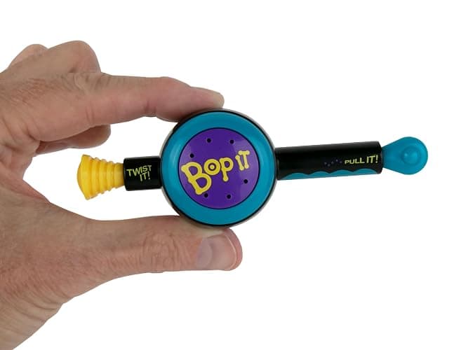 World's Smallest Bop It! The Classic Game of Bop It, Twist It, Pull It in Miniature Size. Travel Electronic Game. Play Solo or with Multiple Players - Image 1