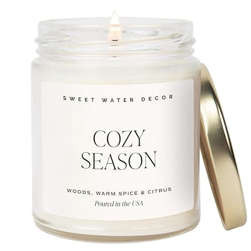 Sweet Water Decor Cozy Season Candle, 9oz Clear Jar, Winter & Autumn Scent | Woods, Warm Spice & Citrus Scented Soy Wax Candle, Gold Lid, 40+ Hour Burn Time, Fall Home Decor, Holiday Gift - Image 1