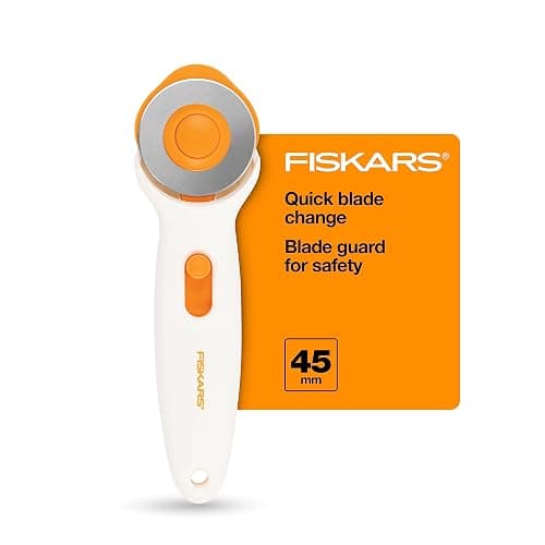 Fiskars 45mm Rotary Cutter for Fabric, Premium Steel Stick Fabric Cutter Cuts Through Multiple Layers, Right and Left Handed, Easy and Safe Blade Change, Arts and Crafts, Sewing and Quilting Tools - Image 1