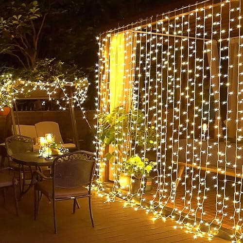 JMEXSUSS 300 LED Remote Control Christmas Curtain Lights, Plug in Fairy Curtain Lights Outdoor, Window Wall Hanging String Lights for Bedroom Backdrop Wedding Party Indoor Patio Xmas Decor, Warm White - Image 1
